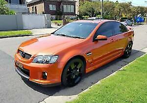 PAINTED HOLDEN VE SS SEDAN REAR WINDOW SPOILER - Ignition Orange (341N)
